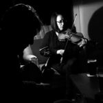 andi leahy peter gallagher black and white black woman playing fiddle violin 2