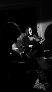 andi leahy peter gallagher black and white black woman playing fiddle violin 2